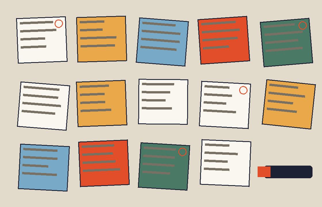 Observation notes and research cards spread across a table during a usability study